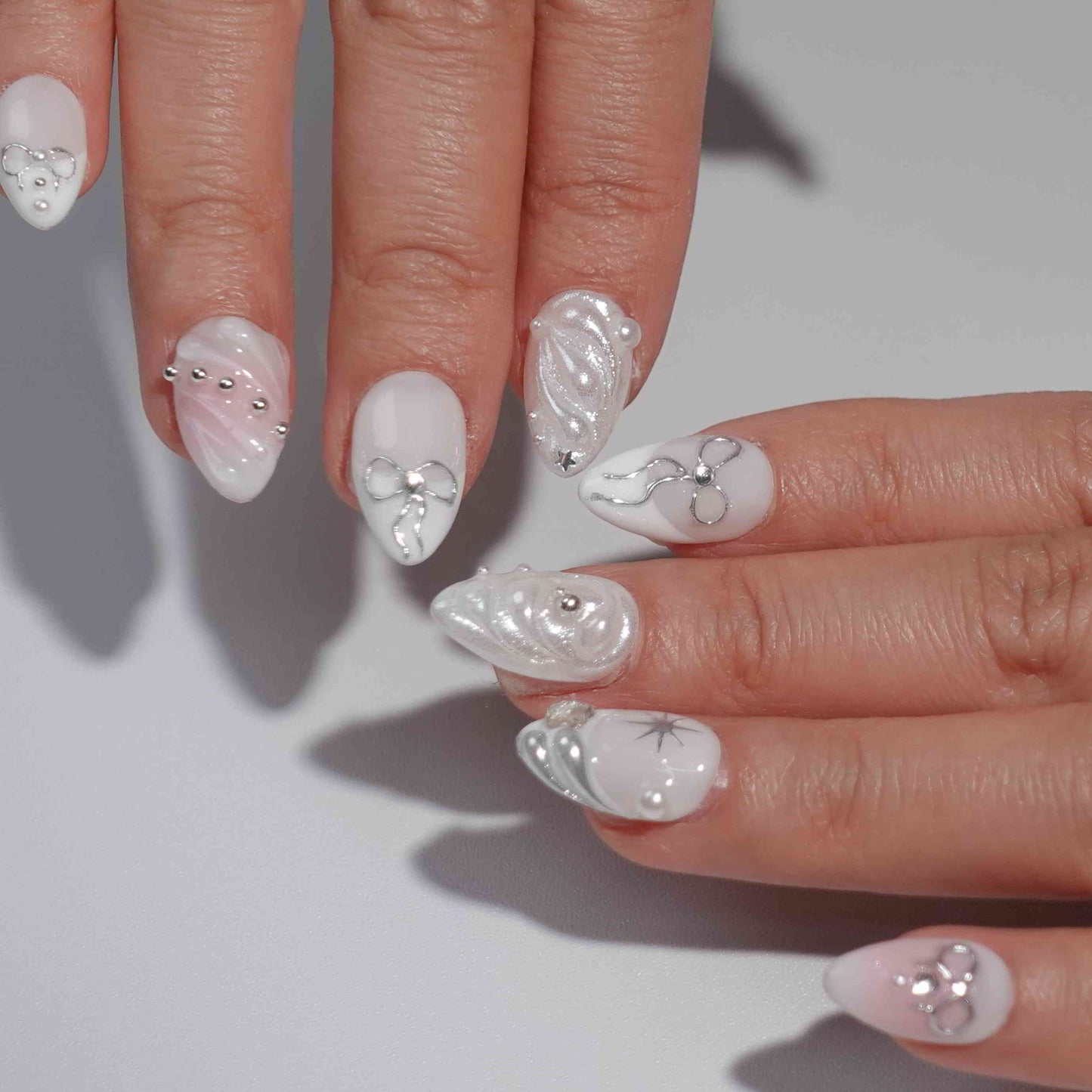 Silver Morning short almond chrome silver press on nails by Kakakoo detail photo 3