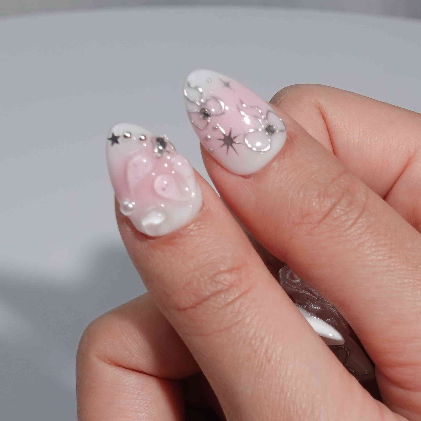 Silver Morning short almond chrome silver press on nails by Kakakoo detail photo 2