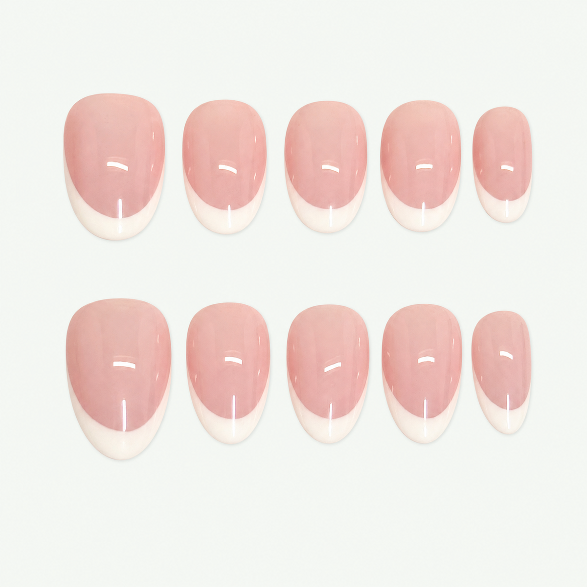 White French press-on nail set with pink bases and white tips