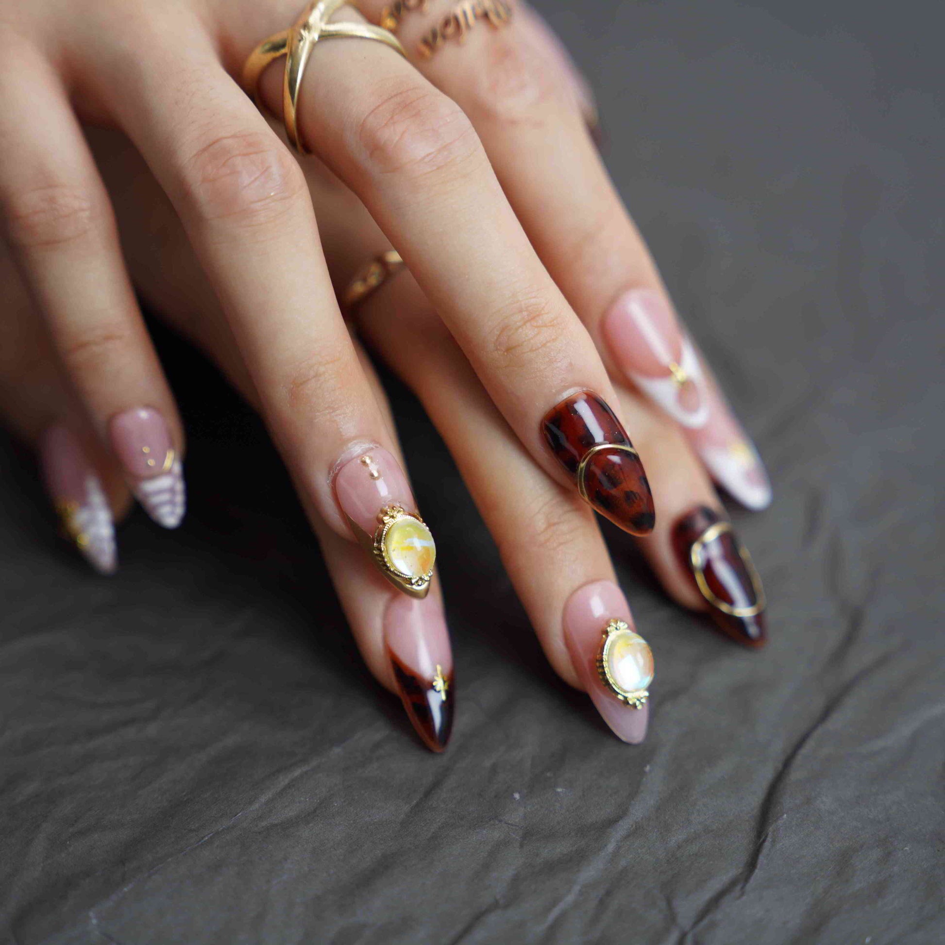 Golden Glitz medium almond French tip gold press on nails by Kakakoo detail photo 2