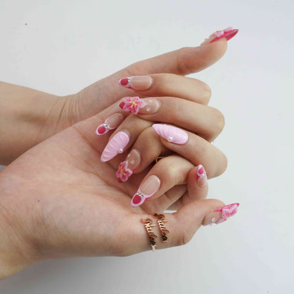 Lily Glow medium almond floral press on nails by Kakakoo detail photo 2